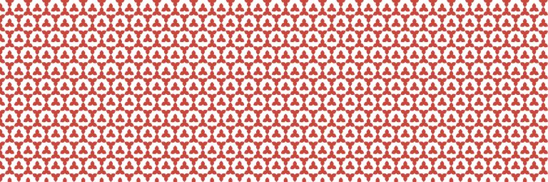 Gęsty, powtarzalny geometryczny wzór na białym tle — małe czerwone motywy z trzech zaokrąglonych „łezek” ułożonych w trójkąt, rozmieszczone regularnie w siatce tworzącej sześciokątne pola.